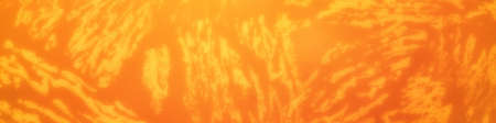 Panorama of orange pattern wallpaper with irregular stripes as an abstract background.の写真素材