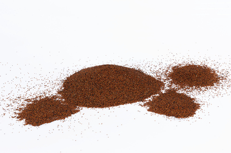 Heap of red quinoa isolated on white background.の写真素材