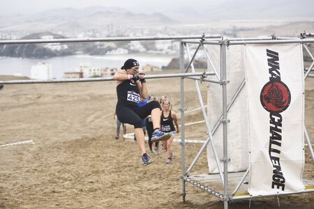 LIMA, PERU - OCTOBER 23, 2016: Inka Challenge, an extreme obstacle course where 1500 athletes from...