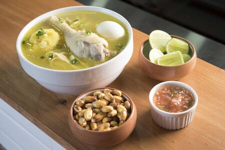 caldo de gallina, the classic Peruvian chicken noodle soup. Canchaの写真素材