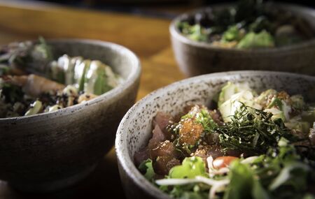 Salmon poke with avocado, seaweed, pickled carrots and cucumber. Niceの写真素材