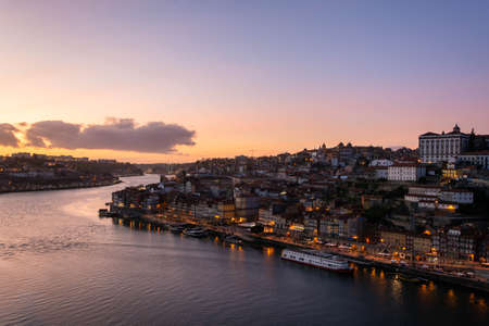 View to the beautiful city of Porto from D. Luis I bridge at sunsetの写真素材