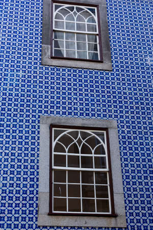 Traditional Portuguese facade with two windows. Portoの写真素材