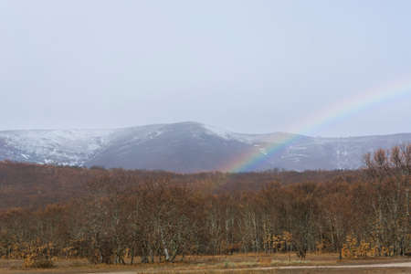 Snowy mountains, rainbow and beautiful trees. Sanabria, Spainの写真素材
