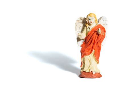Christmas porcelain crib angel, white backgroundの写真素材