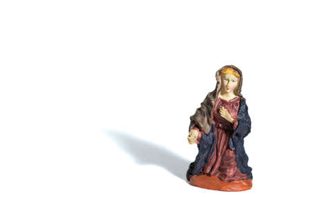 Christmas porcelain crib Mary, white backgroundの写真素材