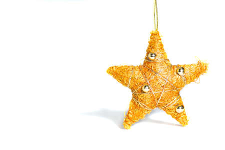 Golden Christmas star, white backgroundの写真素材