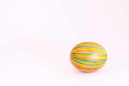 Colorful Easter egg and white background