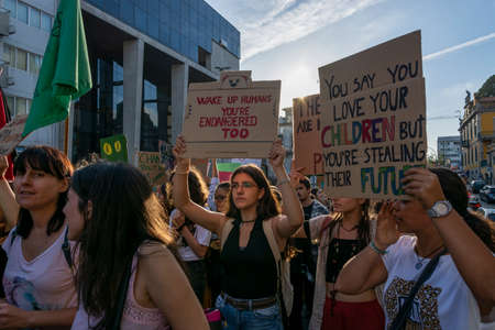 People with placards and posters on global strike for climate change. Porto, Portugalのeditorial素材