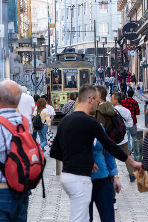 Tram and people walking in Santa Catarina street (Porto). Big crowdのeditorial素材