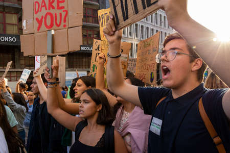 People with placards and posters on global strike for climate change. Porto, Portugalのeditorial素材