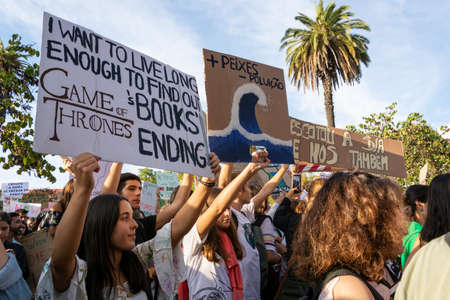People with placards and posters on global strike for climate change. Porto, Portugalのeditorial素材