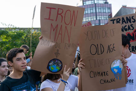 People with placards and posters on global strike for climate change. Porto, Portugalのeditorial素材