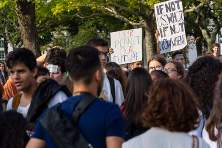 People with placards and posters on global strike for climate change. Porto, Portugalのeditorial素材