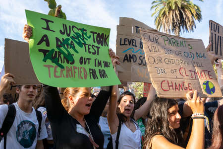 People with placards and posters on global strike for climate change. Porto, Portugalのeditorial素材