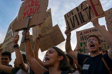People with placards and posters on global strike for climate change. Porto, Portugalのeditorial素材