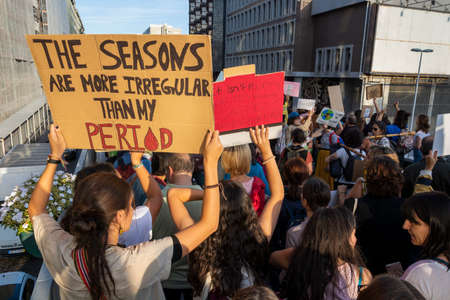 People with placards and posters on global strike for climate change. Porto, Portugalのeditorial素材