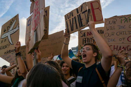 People with placards and posters on global strike for climate change. Porto, Portugalのeditorial素材
