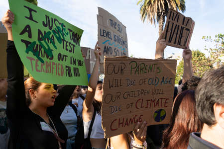 People with placards and posters on global strike for climate change. Porto, Portugalのeditorial素材