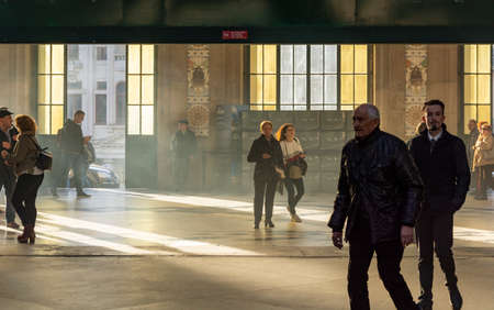 Porto, Portugal - 02/17/2020: SÃ£o bento railway station illuminated by the warm light passing...