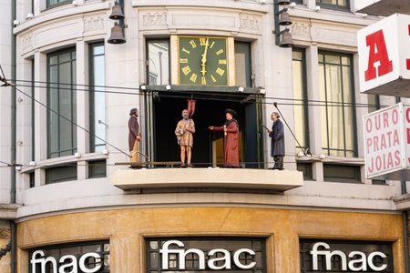 Porto, Portugal - 08/28/2019: Santa Catarina street clock performance. Statues move while music is playing.のeditorial素材