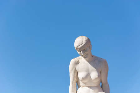 Statue of a naked creepy woman. Blue sky. Porto, Portugal.のeditorial素材