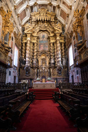 Interior of Porto Cathedral, medieval building. Red carpet. Porto, Portugal.のeditorial素材