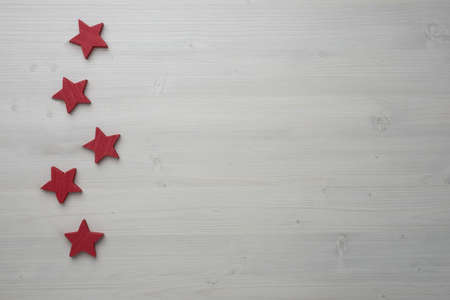 Wood background isolated with red stars
