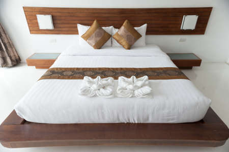 Hotel room bed luxury pillow.の写真素材