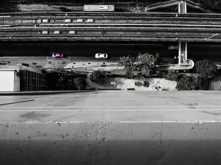 Black and white cars motorway from above.