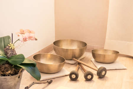 swinging singing bowl equipment wellness.の写真素材