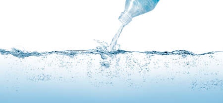 Large water surface and bottle pouring water with splashing effect.の写真素材