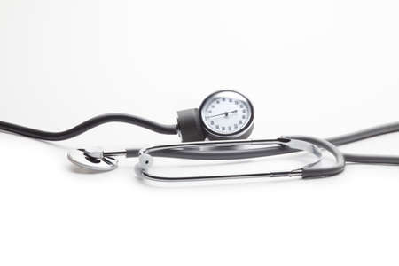 Blood pressure kit against white background. Pressure gauge and stethoscope. Horizontal set for banner useの写真素材