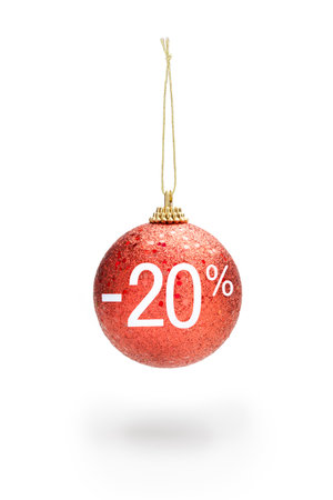 Sale off concept. Sparkling red color Christmas ball hanging from cord. 20% sale offの写真素材