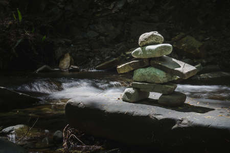 Inuksuk is a figure made of piled stones constructed to communicate with humans throughout the Arctic.の写真素材