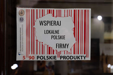 Information on shop window on campaign supporting Polish products saying "support local Polish companies"のeditorial素材