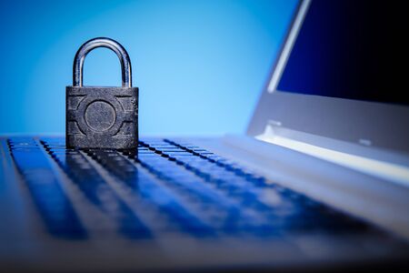 Laptop with an locked lock on it.