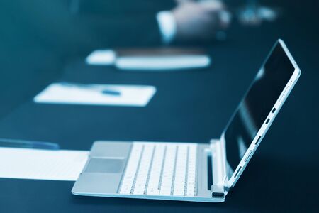 Modern office workplace with laptop computersの写真素材