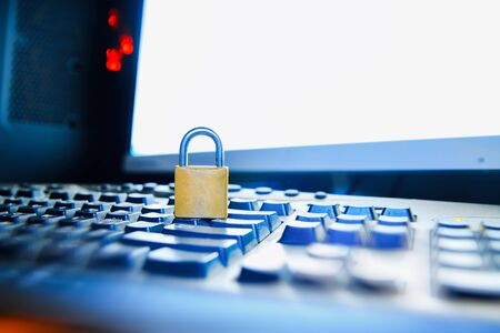 Selective focus on metal lock on laptop  keyboardの写真素材