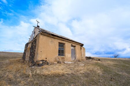 Old house in a fieldの写真素材