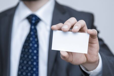 Businessman holding visit card.の写真素材