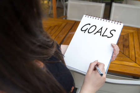 The woman is writing goalsの写真素材