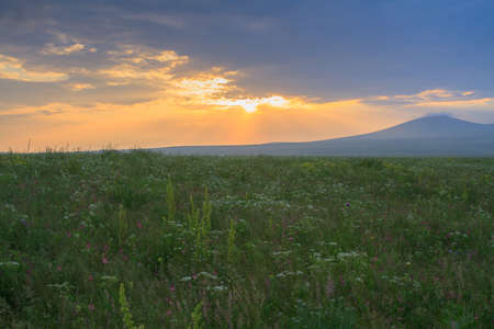 Majestic sunset in the mountains landscape.の写真素材