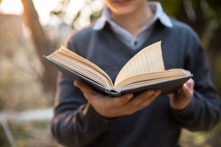 Man hand book in nature