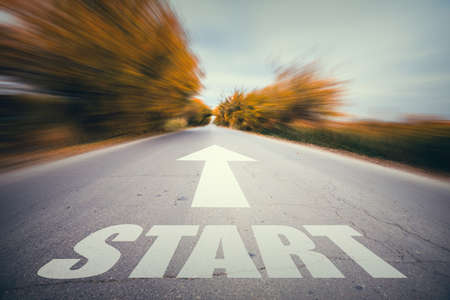 Road with start text under skyの写真素材