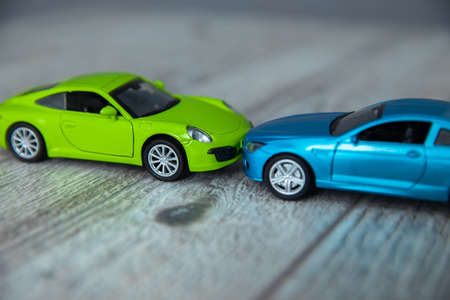 Close up of toy cars crash