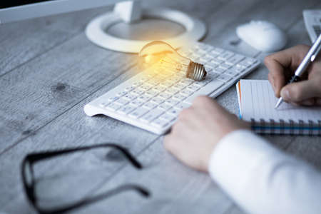 business man hand notepad working in office