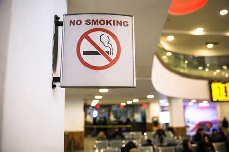 no smoking sign over blurred backgroundの写真素材