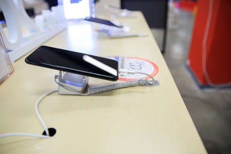 smartphones in the modern electronics store.
