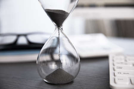 hourglass on the working desk